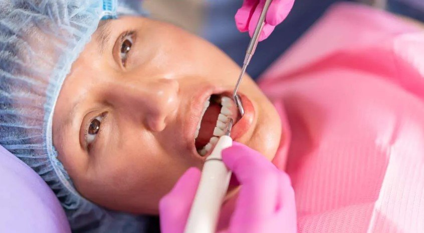 dental check-up for gum disease headache